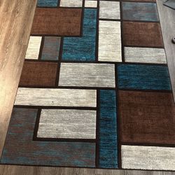 Multi-colored living room area rug. 