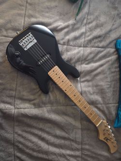 Black electric guitar (travel or student size)