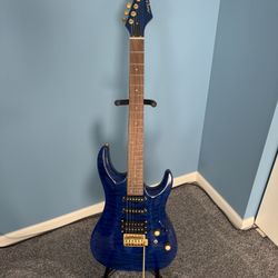 Aria electric guitar with stand and like-new (open box) Crate VTX 15 amplifier