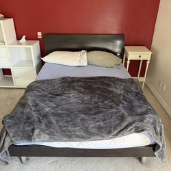 Full size IKEA bed with frame mattress pillows and blanket