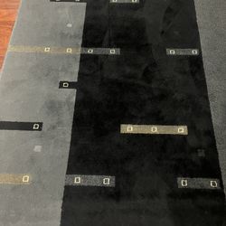 Grey color carpet (Rug)