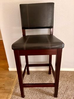Three leather barstools