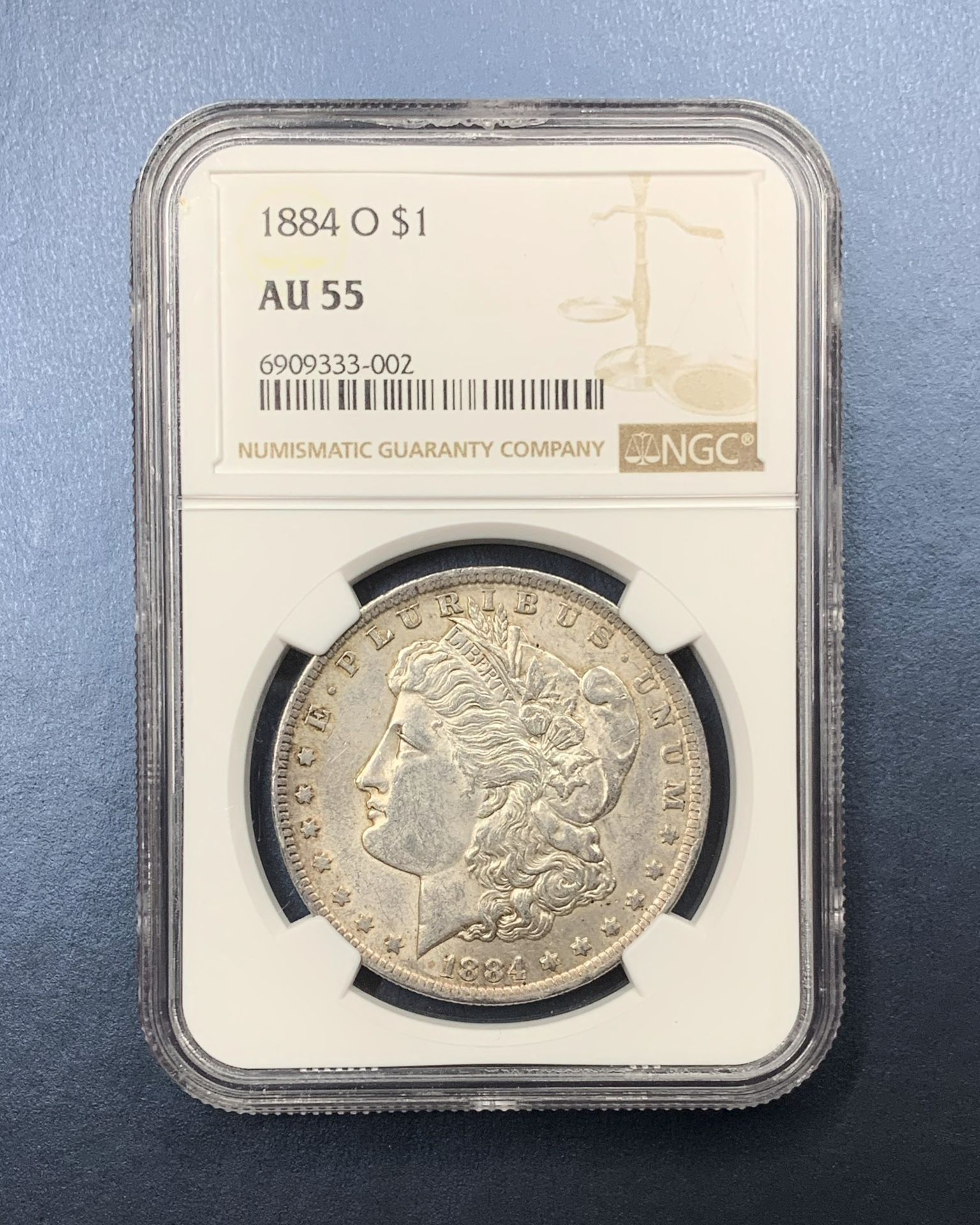 1884-O Morgan Silver Dollar NGC Graded AU55
