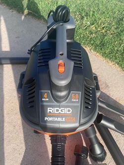 New RIDGID portable vacuum) shop vac 4 gallon