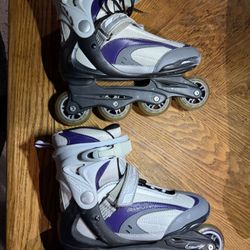 Roller Blades And Pads 