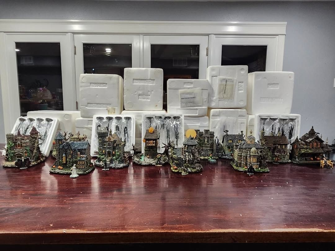 Hawthorne Village Halloween Universal Studio Monsters 11 Piece Village with Spooky Wire Trees. Most of these pieces have a certificate of authenticity