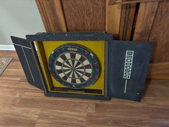Dartboard with Cabinet and some darts