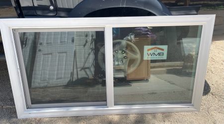 (1) Double glass window, retrofit, 64in (w) x 32in (tall)- NEW