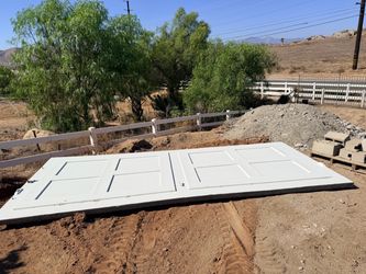 Used wood garage door