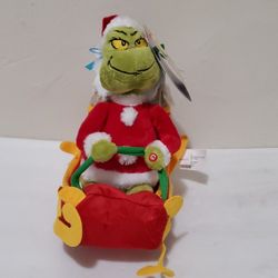 Adorable Plush The Grinch that spins & cruises to "You're A Mean One Mr. Grinch"
