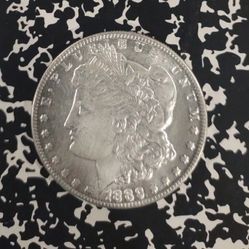 1889-CC MORGAN SILVER DOLLAR.

