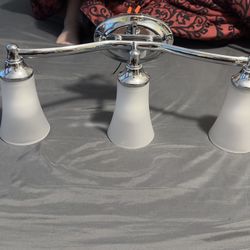 Moen Eva 23" Wide 3 Light Bathroom Vanity Light with Frosted Shades