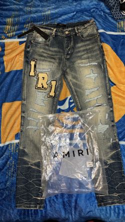 Amiri jean light washed size 34