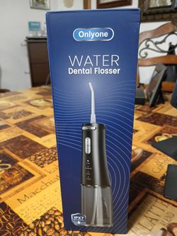 Water dental flosser
