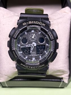 Genuine Casio G Shock GA-100L Men’s Rugged Wristwatch 5081 Military Green/Black