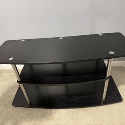 Black curved TV stand
