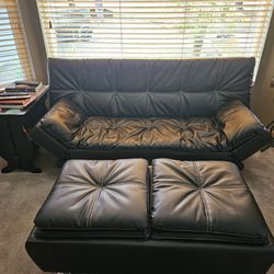 Black Leather Convertible Love Seat And Ottoman
