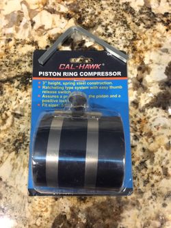 Piston ring compressor