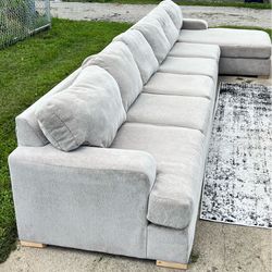 Light Beige Sectional With Lounging Chaise