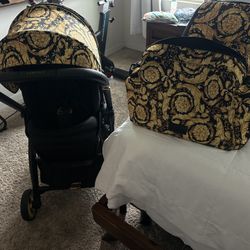 Versace Baby Stroller, Diaper bag, and carrier. 