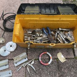 Yellow Toolbox With Miscellaneous Aluminum Piece And Bits