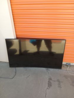 Large Curved Flat Screen TV