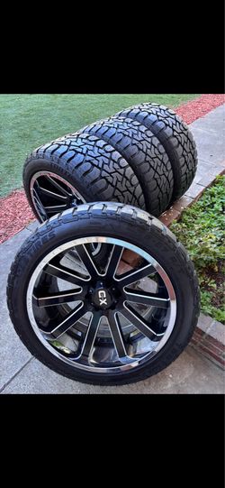 KMC Chevy Silverado 1500 wheels and lime new tires
