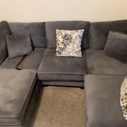 Sectional With Ottoman And Matching Painting To throw pillows Also Queen Real Wood Bed Frame With Mattress And Box Spring And Dresser And Night Stand 