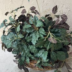 basket with artificial plant