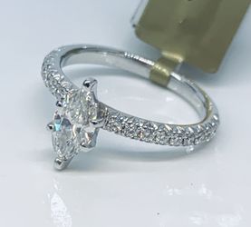New 18 karat solid gold and REAL diamond marquise round engagement ring