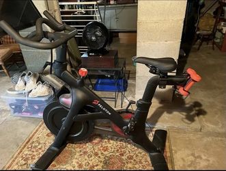 Peloton Bike — Gently/Rarely Used, Bundle with Mat, Hand Weights + Women's Clip-In Shoes