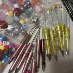 Bundle of beads , spacers and 16 pens