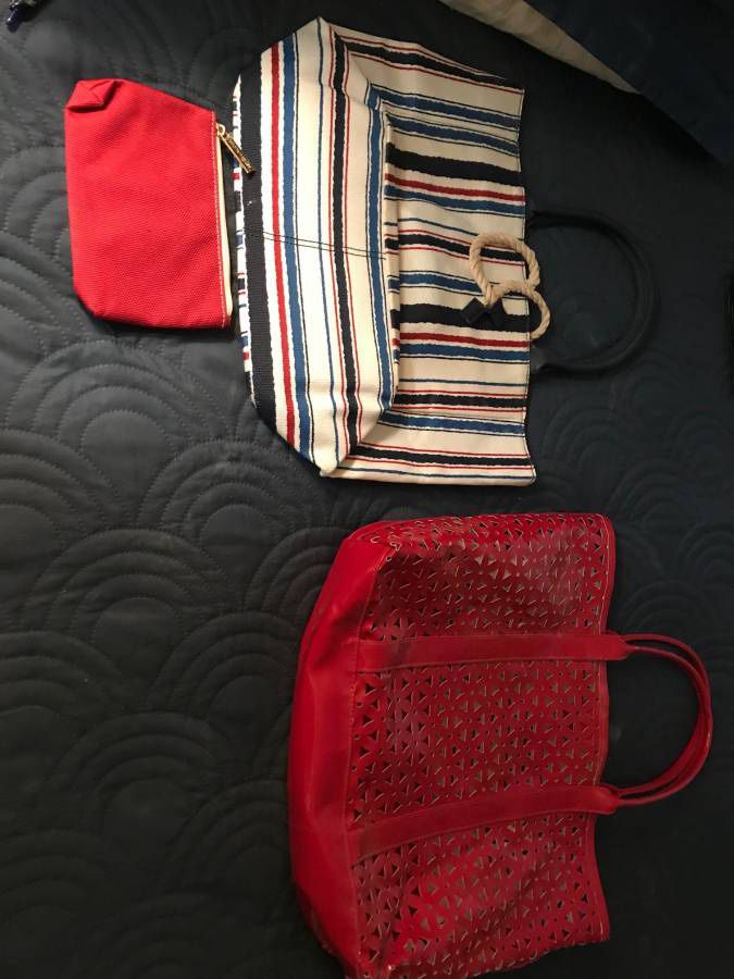 ***2 BAGS FOR SALE- LIKE NEW CONDITION**** STRIPED BAG IS CLOTH/CANVAS RED BAG IS HEAVY GOOD QUALIT
