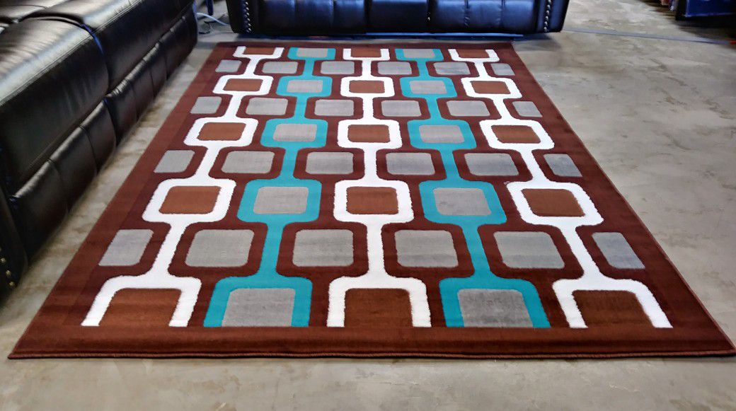 Modern Area rugs looks great on wooden floors