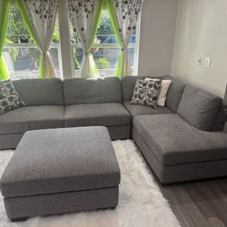 Fabric Sectional With Ottoman Ensemble 