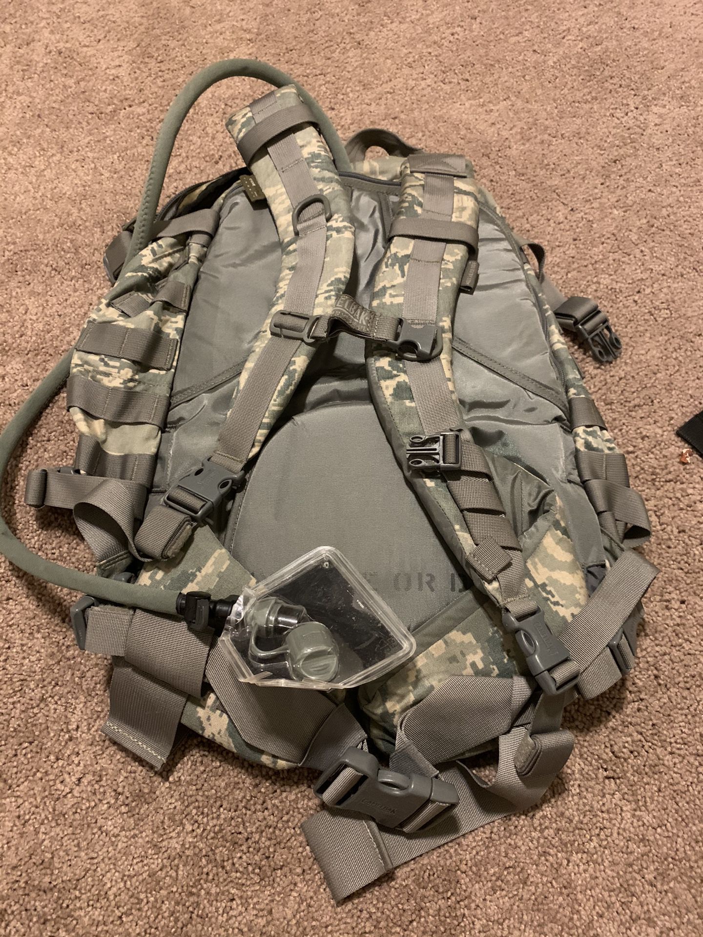 Camo backpack with camel pack brand new