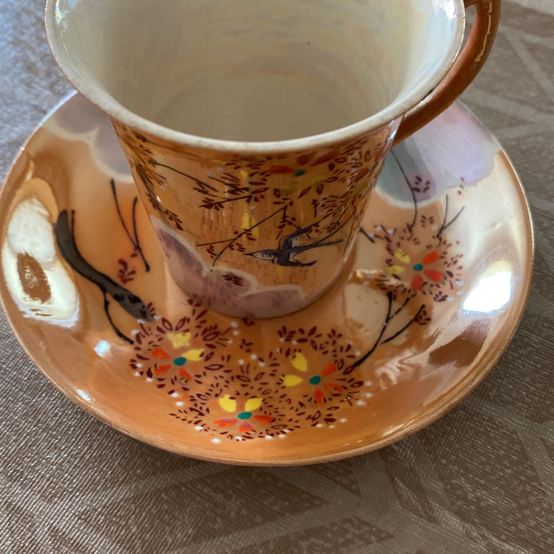 Vintage/antique Hand Painted Japan Luster ware Tea Cup And Saucer