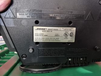 Bose radio with remote. Comes with booklet.