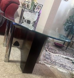 Large oval wood and metal table with 10mm glass