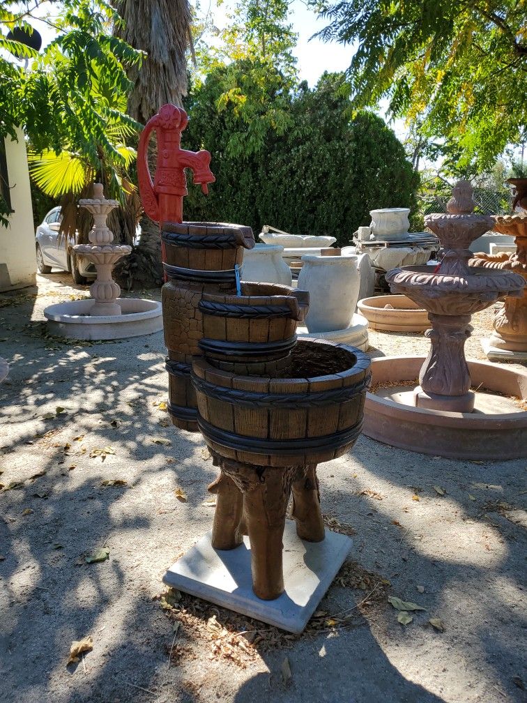 Concrete Fountains, birdbaths, statuary, benches, clay pots and more