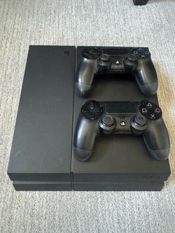 PS4 w/ 2 Controllers and Games