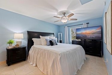 King sleigh style platform bed and 2 drawer nightstand