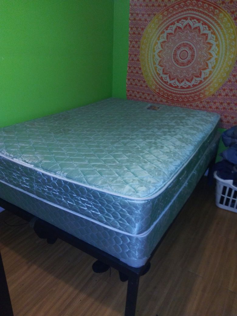 Full size bed and boxspring with metal frame