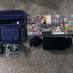 Nintendo Switch + Games + Case