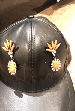 Orange earrings with silver diamonds