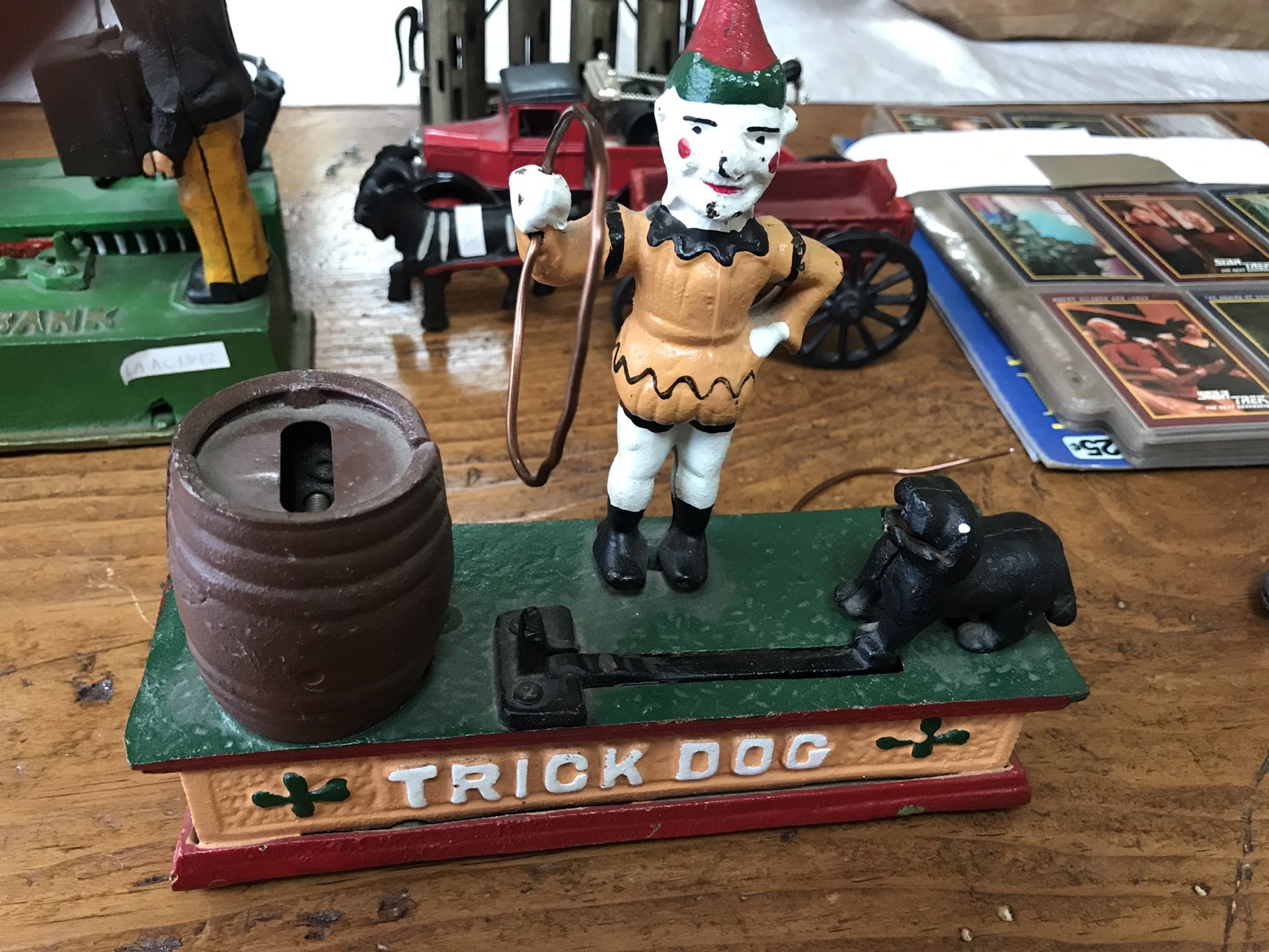 TRICK DOG CAST IRON COIN BANK