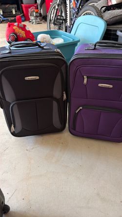 Black and Purple Rockland Suitcases