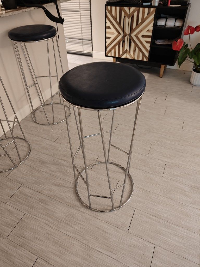 Forest swivel bar stool by Arik Levy