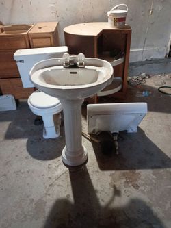 White Ceramic Pedestal Sink with Faucet