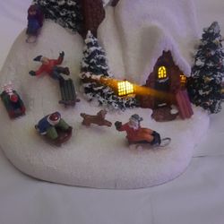 Thomas Kinkade
Painter of Light Christmas
The Sleigh Ride Light Up House Village